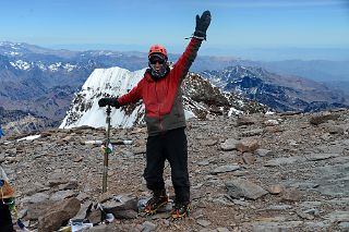 44 Jerome Ryan With The Aconcagua Summit 6962m Cross And Aconcagua South Summit Behind.jpg
